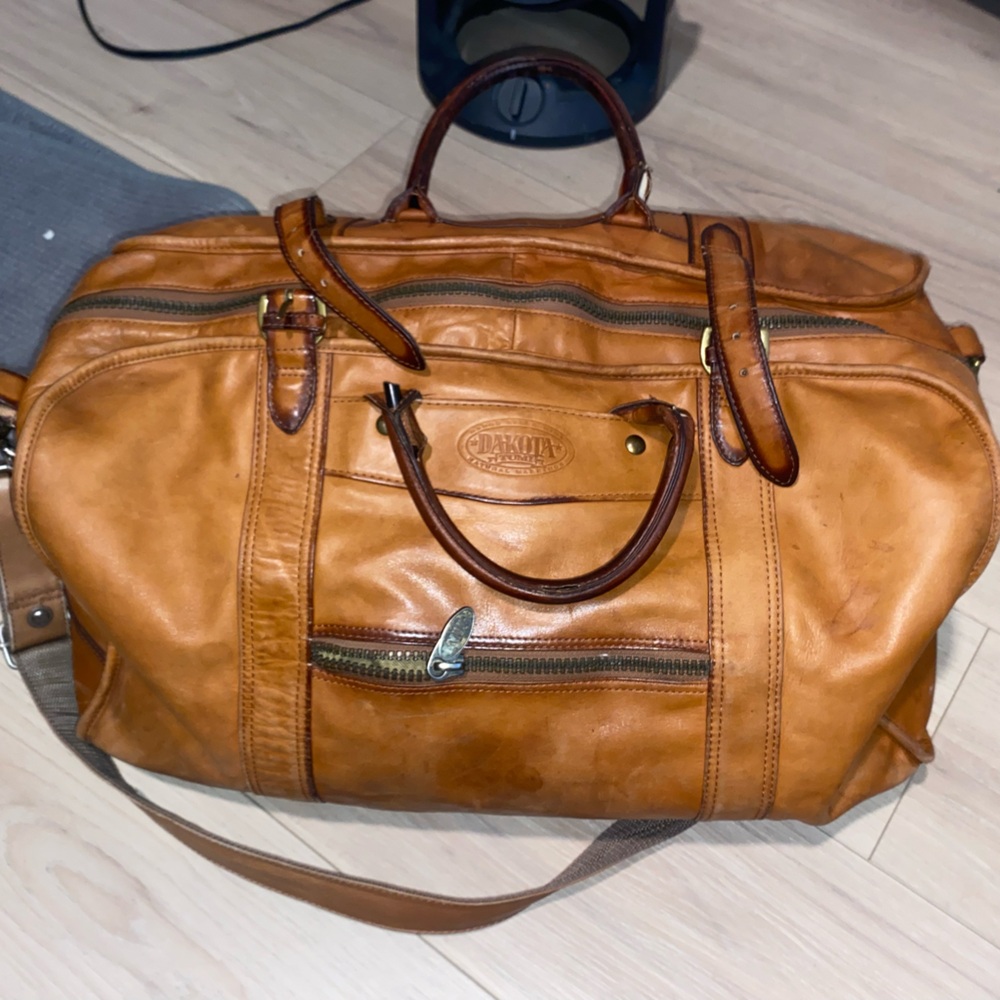 Dakota tumi brown leather bag